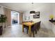 Dining area with patio access and pool view at 2621 Bugatti Ct, Kissimmee, FL 34746