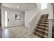 Spacious entryway with tile floors and staircase at 2621 Bugatti Ct, Kissimmee, FL 34746