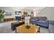 Open concept living room with modern furniture and decor at 2621 Bugatti Ct, Kissimmee, FL 34746