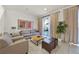 Spacious living area with comfy seating and lots of light at 2621 Bugatti Ct, Kissimmee, FL 34746