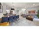 Open living and dining area with tile floors and modern decor at 2621 Bugatti Ct, Kissimmee, FL 34746