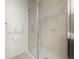 Large walk-in shower with glass enclosure at 2621 Bugatti Ct, Kissimmee, FL 34746