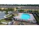 Aerial view of community pool and playground at 272 Muscogee Ln, Orlando, FL 32825