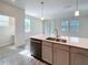 Modern kitchen with stainless steel appliances and stylish countertops at 272 Muscogee Ln, Orlando, FL 32825