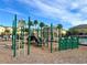 Community playground with play structures at 272 Muscogee Ln, Orlando, FL 32825