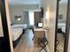 Hotel room with two double beds and a work area at 3000 Maingate Ln # 228, Kissimmee, FL 34747