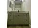 Bathroom with gray vanity, granite countertop, and large mirror at 3011 Hemingway Cir # 3011, Haines City, FL 33844