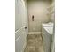 Laundry room with side-by-side washer and dryer, and overhead shelving at 3011 Hemingway Cir # 3011, Haines City, FL 33844