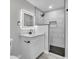 Bathroom featuring a walk-in shower, modern vanity, and illuminated mirror at 3020 Rockingham Cir, Orlando, FL 32808