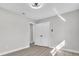 Bedroom with grey luxury vinyl plank, closet and views to additional rooms at 3020 Rockingham Cir, Orlando, FL 32808