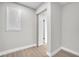 Hallway with closet and doorway leading to another room at 3020 Rockingham Cir, Orlando, FL 32808