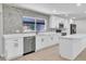 Beautiful kitchen featuring white cabinets, modern backsplash, stainless steel appliances, and an island at 3020 Rockingham Cir, Orlando, FL 32808