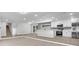Modern kitchen with stainless steel appliances, white cabinetry, and a large center island at 3020 Rockingham Cir, Orlando, FL 32808
