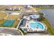 Aerial view showing community pool, clubhouse, and pickleball courts at 3052 Ella Way, Saint Cloud, FL 34771