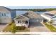 House with lake view and solar panels on roof at 3052 Ella Way, Saint Cloud, FL 34771