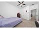 Bright bedroom with double bed and a dresser at 3052 Ella Way, Saint Cloud, FL 34771