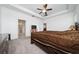 Main bedroom with king-size bed and ensuite bathroom at 3052 Ella Way, Saint Cloud, FL 34771