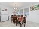 Kitchen features a dining area with table and chairs at 3052 Ella Way, Saint Cloud, FL 34771