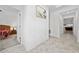 Bright entryway with tile floors, leading to bedroom and living room at 3052 Ella Way, Saint Cloud, FL 34771