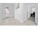 An entryway with tile floors and doors to other rooms at 3052 Ella Way, Saint Cloud, FL 34771