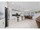 Modern kitchen with stainless steel appliances and island at 3052 Ella Way, Saint Cloud, FL 34771