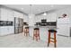 Well-equipped kitchen with island and stainless steel appliances at 3052 Ella Way, Saint Cloud, FL 34771