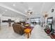 Large living space with open kitchen and water view at 3052 Ella Way, Saint Cloud, FL 34771