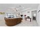 Open living room with water view and a large sectional sofa at 3052 Ella Way, Saint Cloud, FL 34771