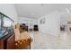 Cozy living room features a futon and home office space at 3052 Ella Way, Saint Cloud, FL 34771