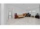 Spacious living area with tile floors and access to entryway at 3052 Ella Way, Saint Cloud, FL 34771