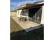 Spacious backyard with patio and screened enclosure at 3309 Sonder Dr, Davenport, FL 33896