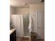 Bathroom with shower and linen closet at 3309 Sonder Dr, Davenport, FL 33896