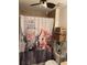 Bathroom with shower, toilet and shelf at 3309 Sonder Dr, Davenport, FL 33896