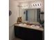 Well-lit bathroom with double sinks and vanity at 3309 Sonder Dr, Davenport, FL 33896
