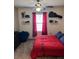 Bedroom with double bed, ceiling fan and decor at 3309 Sonder Dr, Davenport, FL 33896