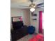 Bedroom with double bed, TV, and ceiling fan at 3309 Sonder Dr, Davenport, FL 33896