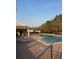 Community swimming pool and lounge area at 3309 Sonder Dr, Davenport, FL 33896