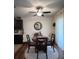 Casual dining area with round table and chairs, and an adjacent kitchen at 3309 Sonder Dr, Davenport, FL 33896