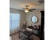 Bright home office with desk and ceiling fan at 3309 Sonder Dr, Davenport, FL 33896