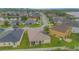 Community overview featuring houses near a lake at 3643 Julius Estates Blvd, Winter Haven, FL 33881