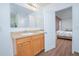 Double vanity bathroom with access to bedroom at 3643 Julius Estates Blvd, Winter Haven, FL 33881