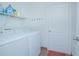 Laundry room with washer, dryer and shelving at 3643 Julius Estates Blvd, Winter Haven, FL 33881