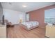 Spacious main bedroom with two windows and a walk-in closet at 3643 Julius Estates Blvd, Winter Haven, FL 33881