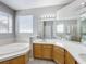 Bathroom with double sinks, soaking tub and shower at 370 Henley Cir, Davenport, FL 33896