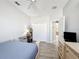 Spacious bedroom with double doors to the closet and bathroom at 370 Henley Cir, Davenport, FL 33896