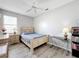 Bedroom with wood flooring and built-in shelving at 370 Henley Cir, Davenport, FL 33896