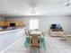 Bright dining room with a table and seating for six at 370 Henley Cir, Davenport, FL 33896