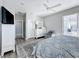 Main bedroom with king bed, ceiling fan and access to patio at 370 Henley Cir, Davenport, FL 33896