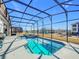 Screened pool and spa with spacious patio area at 370 Henley Cir, Davenport, FL 33896