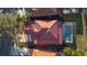 Property view, showcasing the home's tile roof and pool at 384 Orange Cosmos Blvd, Davenport, FL 33837
